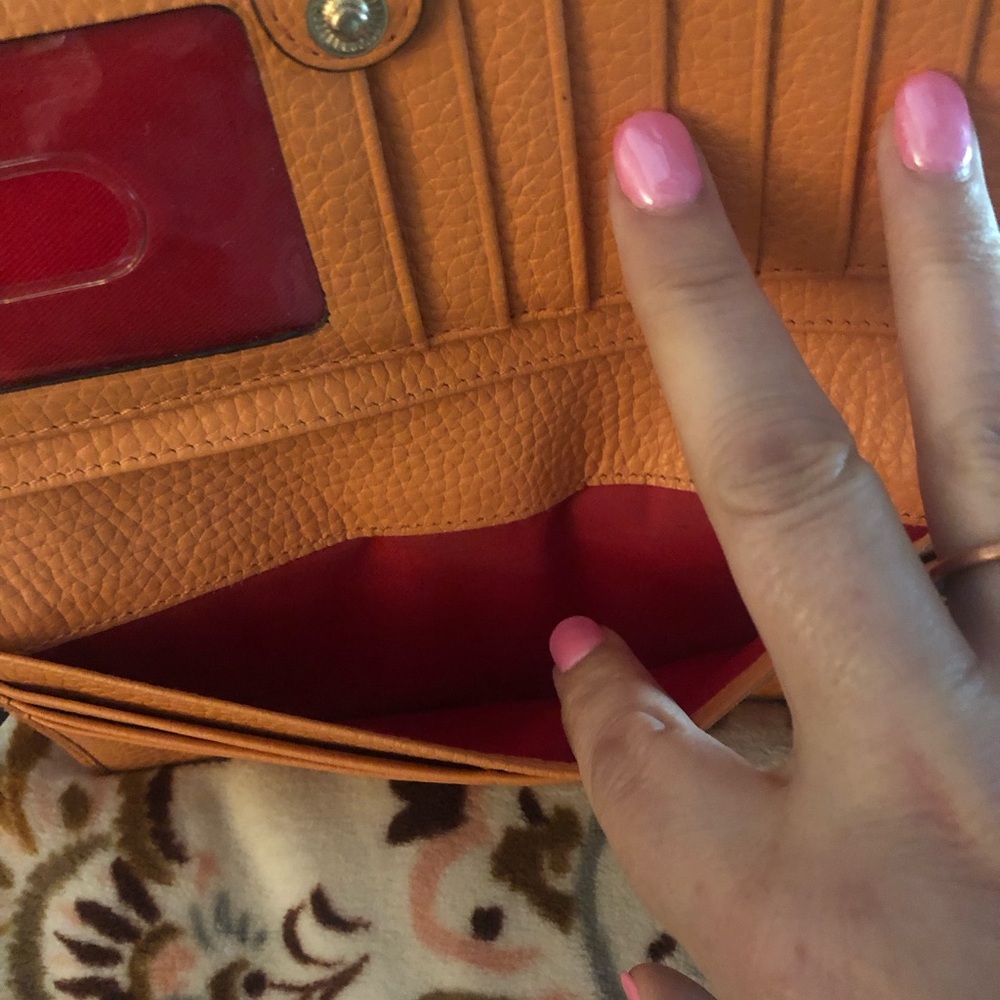 Dooney & Bourke Orange Leather Wallet with Red Interior